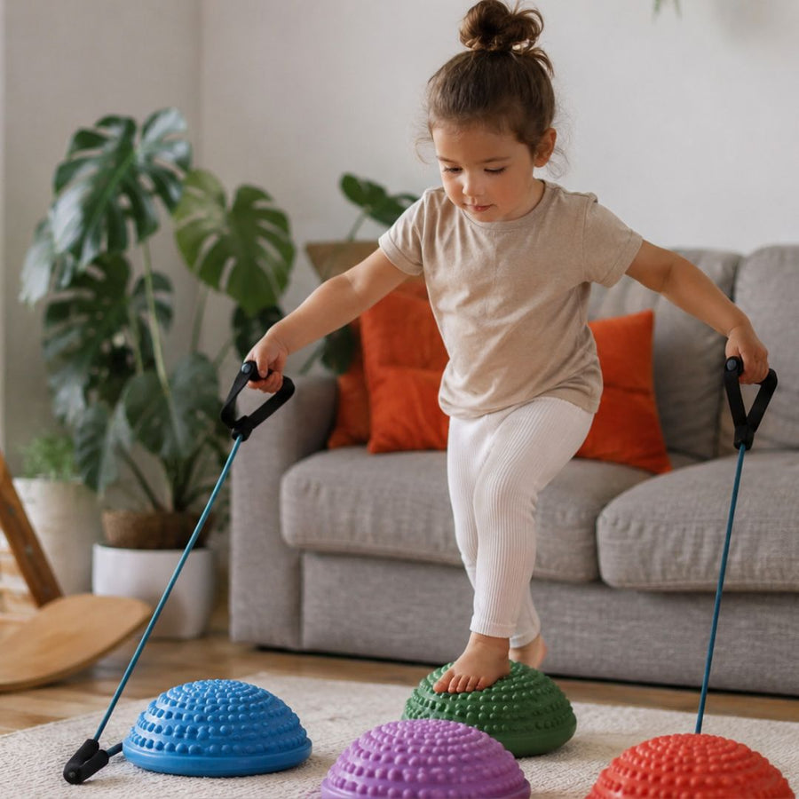 Child playing with resistance toys at home