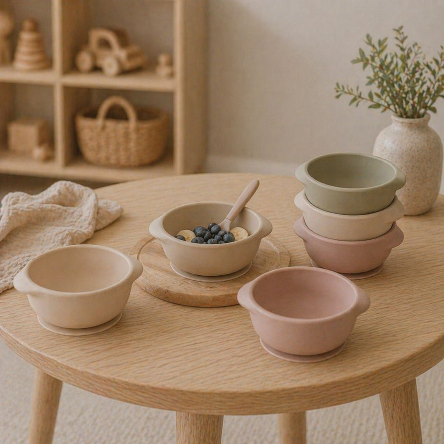 Baby playing with baby bowls