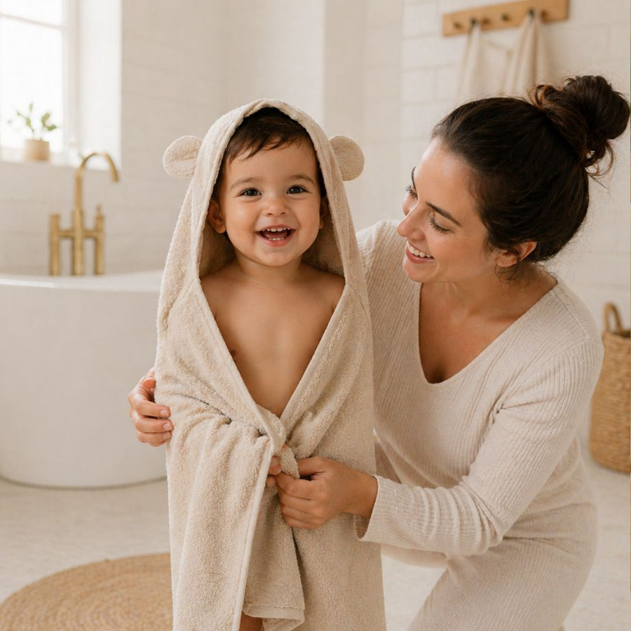 Baby Hooded Towel shown in a nursery setting