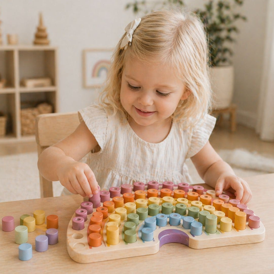 Child playing with peg boards at home