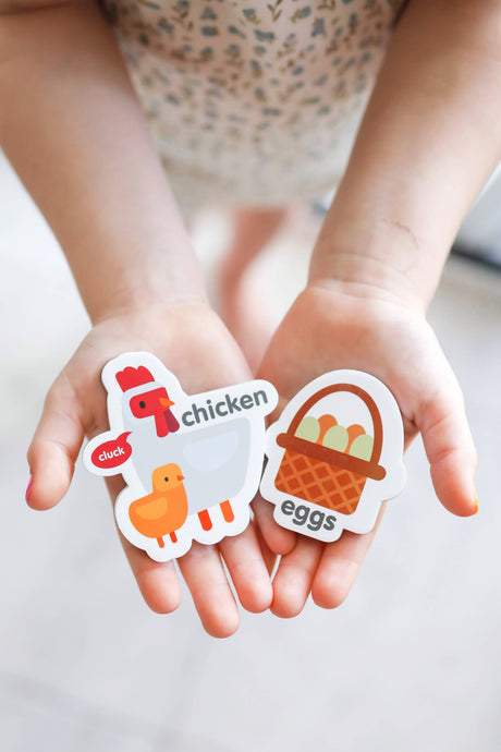 Child playing with the Magnetic Farmyard