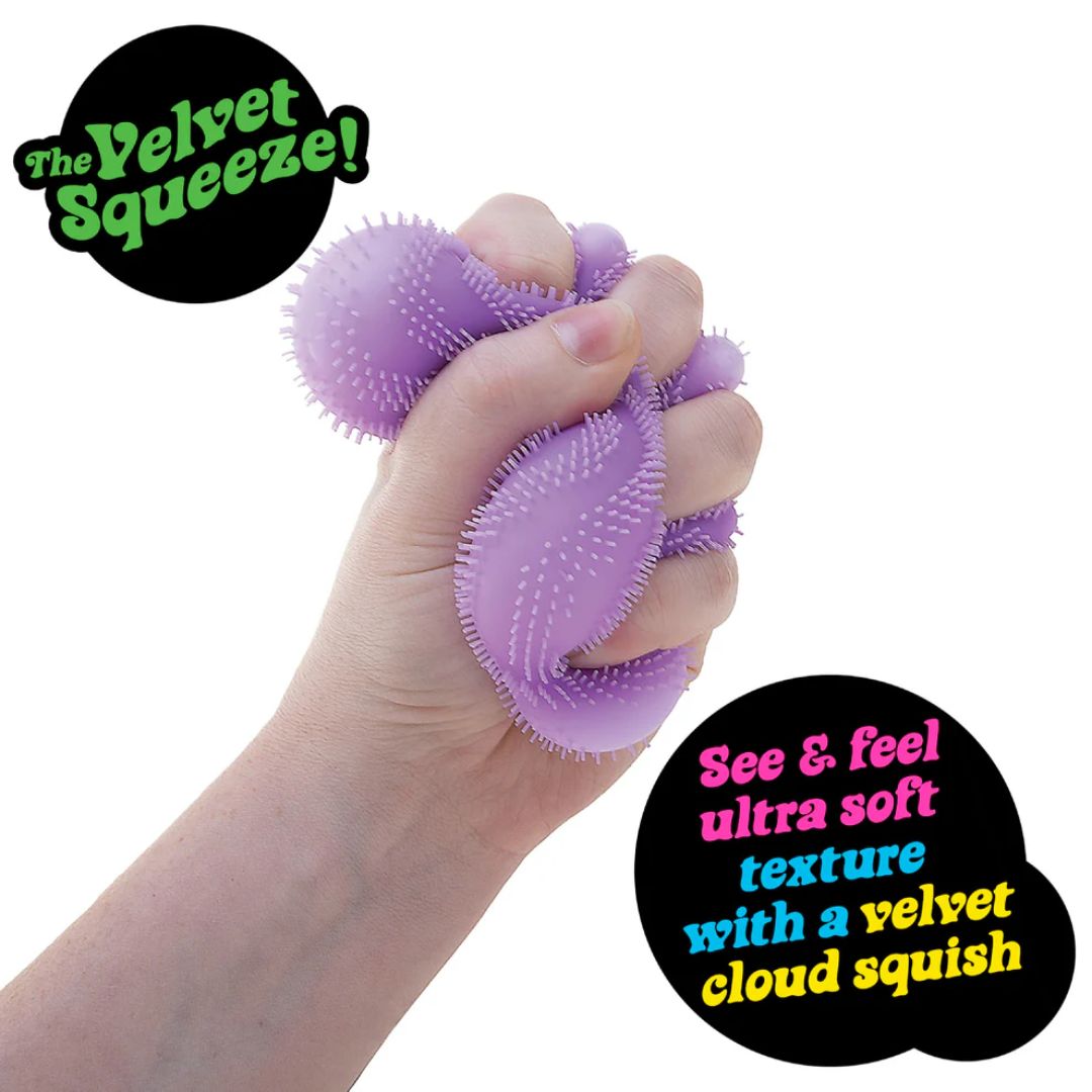Fuzz Ball Wonder Waves NeeDoh sensory fidget toy being squeezed and stretched
