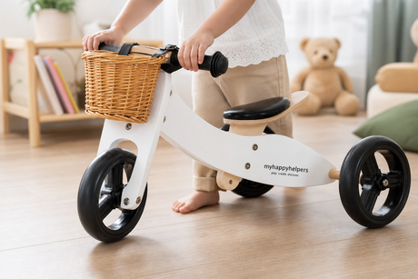 Child playing with the 2 in 1 Mini Trike Range