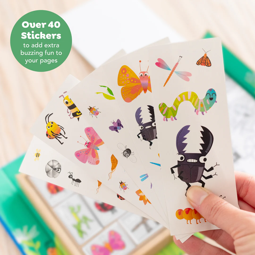 Colouring Set - Backyard Bugs shown in the hand for scale