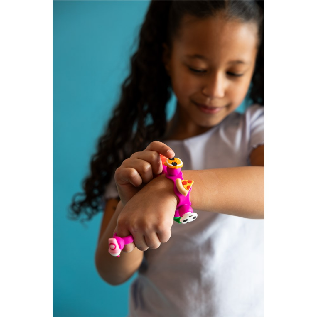 Child playing with the Plip Charms Pink Bracelet
