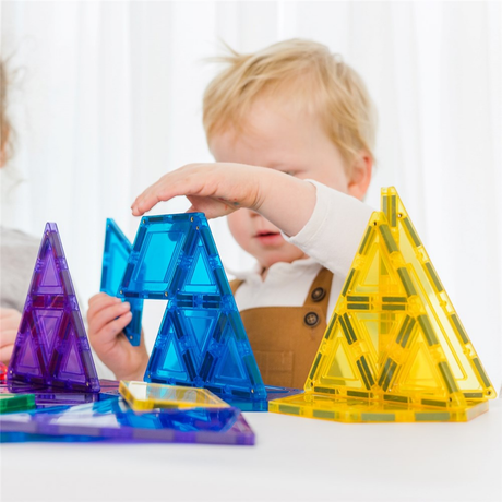 Child building with the TileTek 38 Piece Geometric Tiles Set magnetic tiles