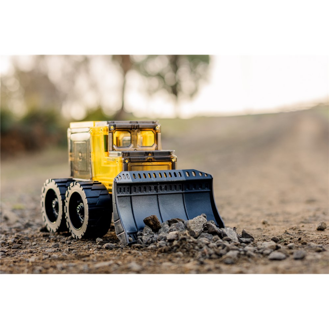 Child building with the TileTek 22 Piece Mega Earth Movers magnetic tiles