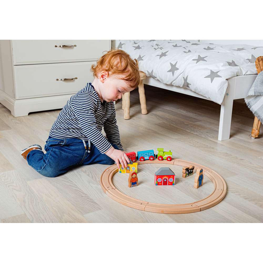 Child playing with My First Train Set