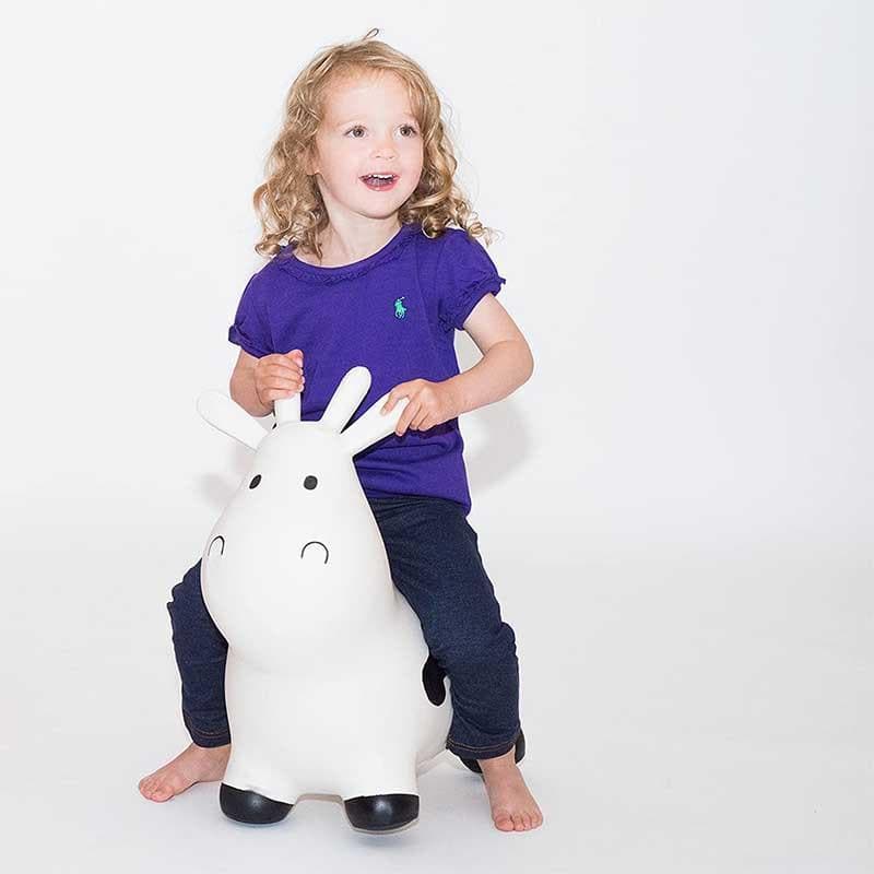 Child bouncing on the White Cow Bouncer