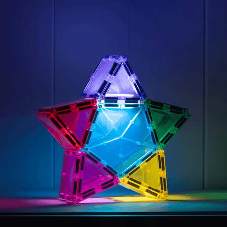 Child building with the Connetix Light Star Pack 28 pc
