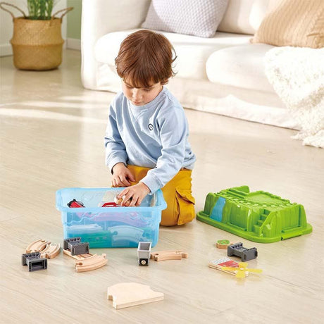 Close-up detail of the Hape Countryside Train Bucket Set wooden toy vehicle