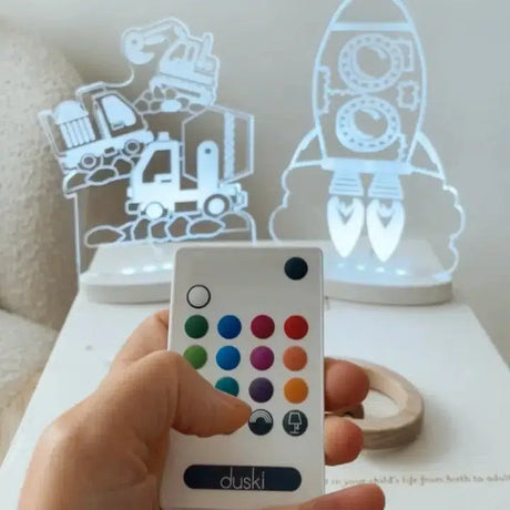 Construction night light glowing on a bedside table