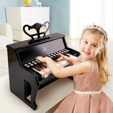 Close-up detail of the Hape Learn with Lights Piano, Black musical toy