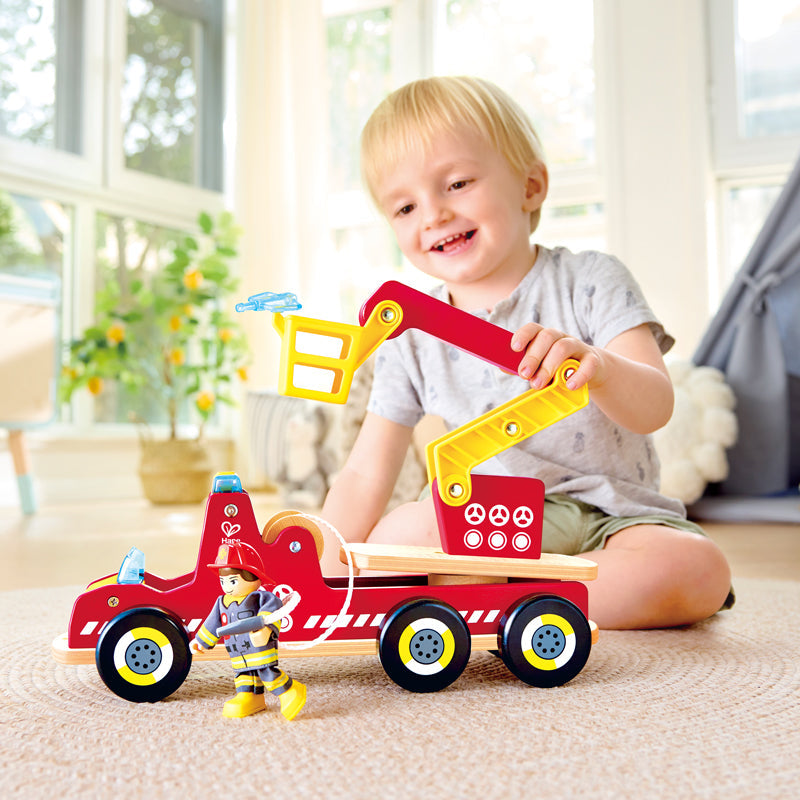Close-up detail of the Hape Siren & Lights Toy Fire Truck pretend play set