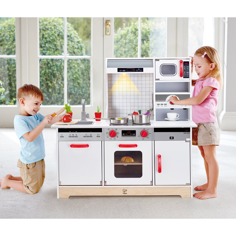 Close-up detail of the Hape All-in-1 Kitchen play kitchen