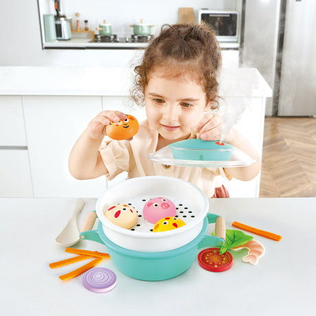 Close-up detail of the Hape Little Chef Cooking & Steam Playset Plus play kitchen