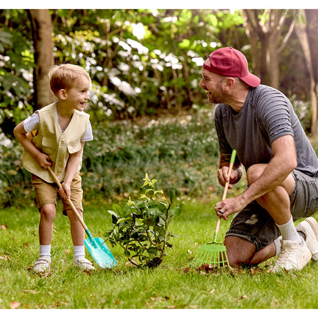 Close-up detail of the Hape Garden Spade wooden toy