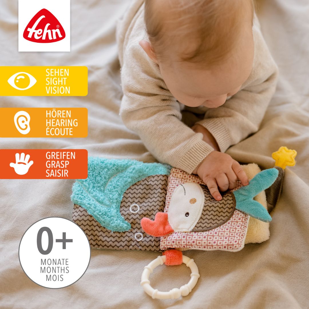 Fehn Soft Book Bruno shown in scale against a hand