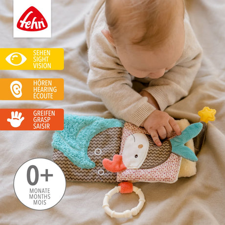 Fehn Soft Book Bruno shown in scale against a hand