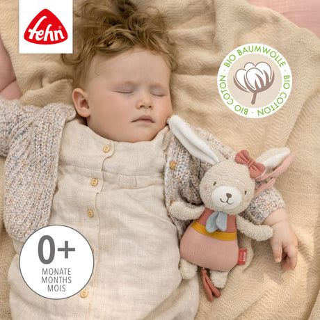 FehnNATUR Mini Musical Hare in use by a baby