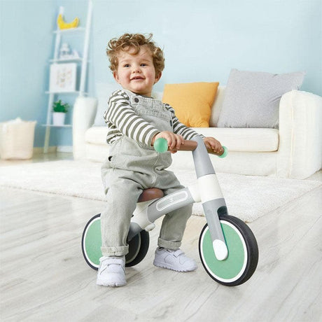 Close-up detail of the Hape First Ride Balance Bike wooden balance and movement toy