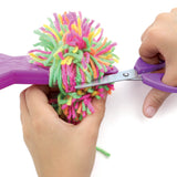 Nebulous Stars Pompom Animoulous in use during a craft session