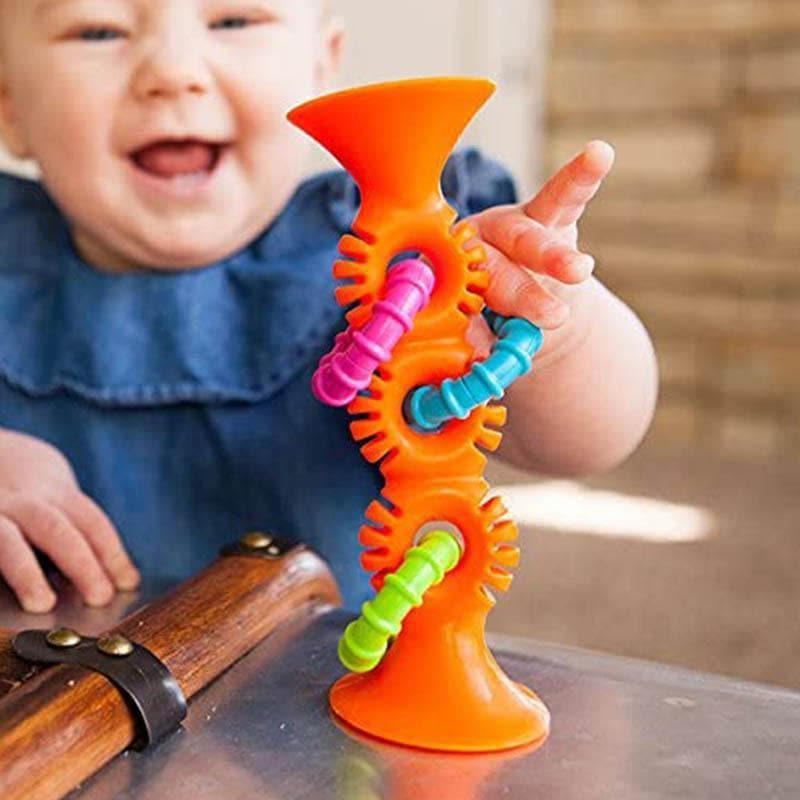 Pip Squigz Loops shown in the hand for scale