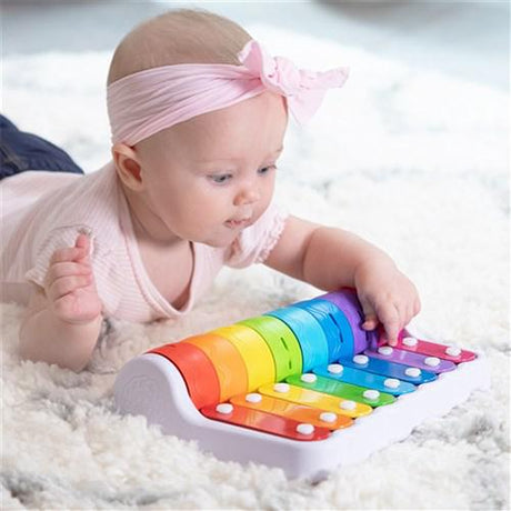 Child playing with the Rock 'N Roller Piano