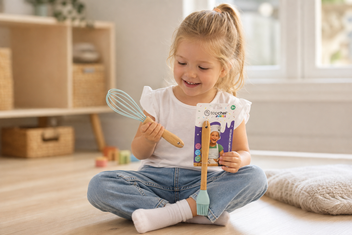 Child playing with the Baking Utensil For Kids Whisk